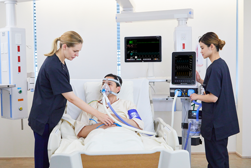 NK-440 being used by a patient and nurses